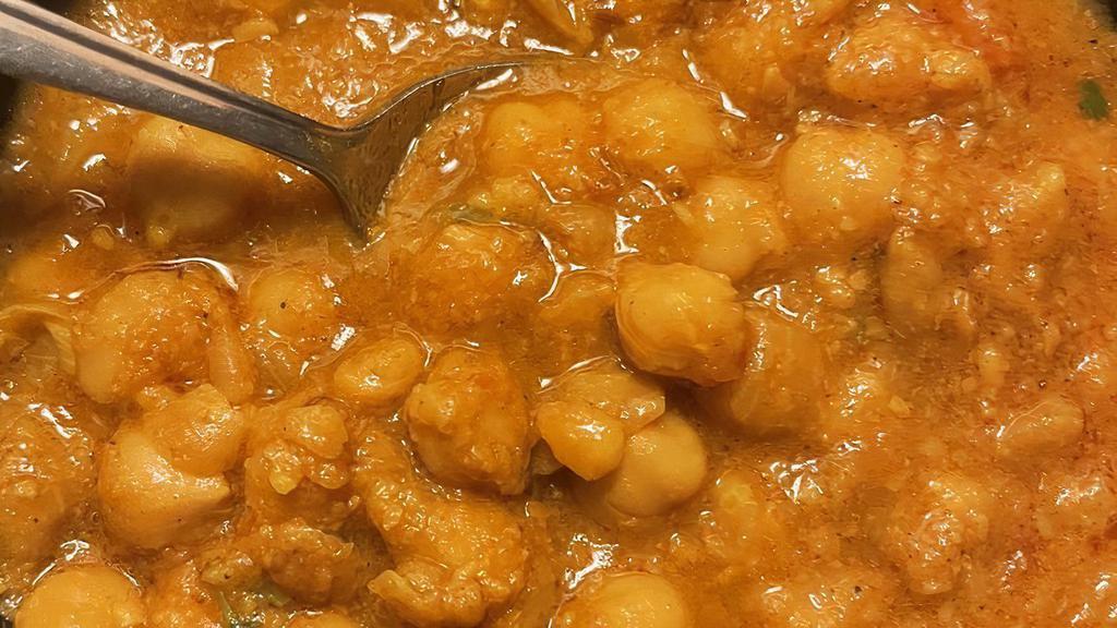 Channa Masala · Vegan, gluten free, vegetarian. Chickpeas cooked in Indian spices and gravy.