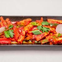 Karampodi Paneer · Deep fried paneer cooked in special red chilli sauce
