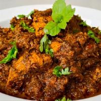 Gongura Goat · Goat cooked with red sorrel leaves & special spices