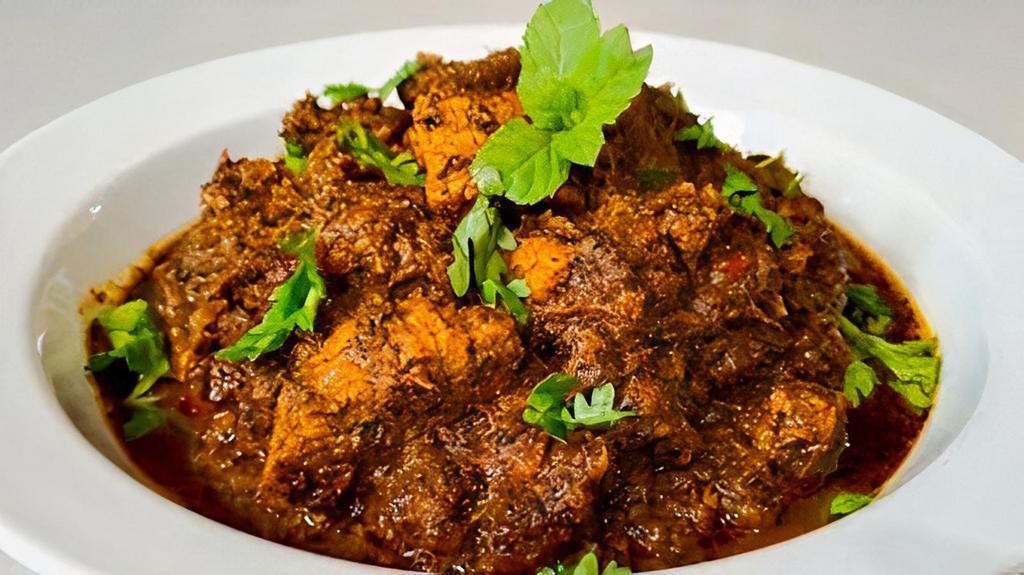 Gongura Lamb · Lamb cooked with red sorrel leaves & special spices