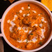 Butter Chicken · Chicken sauteed in butter & blend of spices
