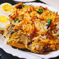 Hyderabadi Chicken Dum Biryani · Chicken Dum Biryani is an authentic Hyderabadi rice dish which is a popular Dum Biryani reci...