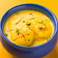 Rasmalai · House made cheese patties served in cold sweetened milk