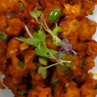 Gobi Manchurian · Vegan. Cauliflower florets sautéed in a spicy and tangy sauce and prepared in an Indo-Chines...