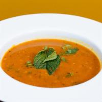 Basil Rasam · Gluten-free, vegan. Light soup made with tamarind, garlic, pepper, red chilies, and basil.