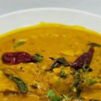 Malabar Fish Curry · Gluten-free. Fresh fish cooked with coconut milk and tamarind sauce in Kerala style.