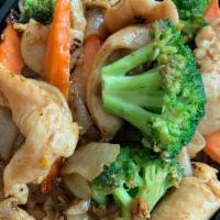 Pad See You · Stir-fried thai style flat noodles with egg, broccoli and carrot.