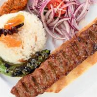 Adana · Ground lamb kebab, rice pilav with orzo served with pita