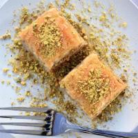 Baklava · Layered filo pastry with walnuts garnish with pistachios