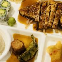 Chicken Teriyaki
 · Served with miso soup or salad, four pieces California roll, fried shrimp shumai, fried pork...