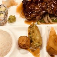 Steak Teriyaki
 · Served with miso soup or salad, four pieces California roll, fried shrimp shumai, fried pork...