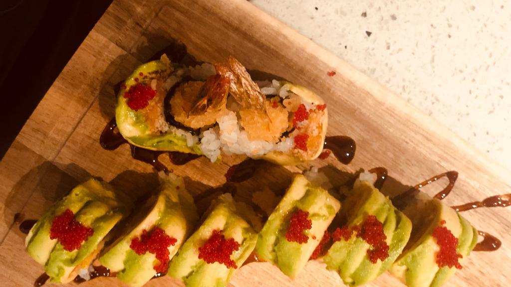 Out Of Control Roll · Shrimp tempura, mango roll. Topped with spicy crunch tuna. Avocado, tobiko, and eel sauce.