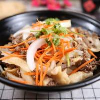 Cumin Lamb Hand-Pulled Noodle / 孜然羊肉拌面 · Freshly hand - pulled noodles with cumin spices lamb fried with sweet onion, chilly oil, bea...