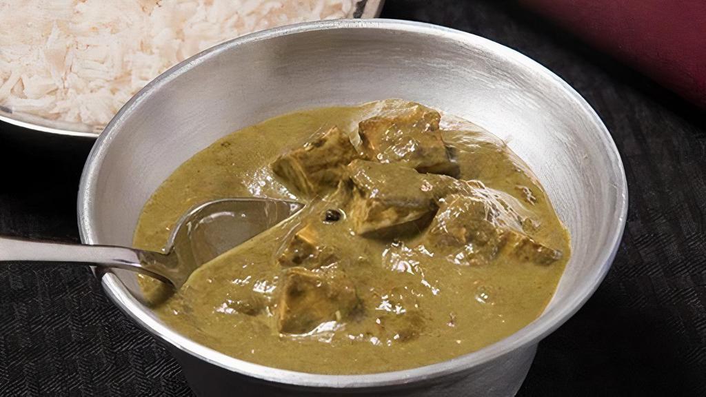 Palak Paneer · Cheese cooked with fresh spinach, spices, and cream.