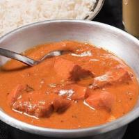 Chicken Tikka Masala · Chunks of chicken in clay oven and then cooked in a light creamy tomato sauce with bell pepp...