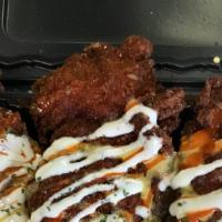 Loaded Homemade Chicken Tenders · 3 hand breaded tenders, Mac and cheese, French fries and choice of sauce