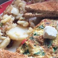 Australian · Feta, spinach, and mushrooms.  Served with home fries and toast.