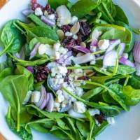 Spinach Delight · Baby spinach, dried cranberries, diced almonds, crumbled goat cheese and red onions