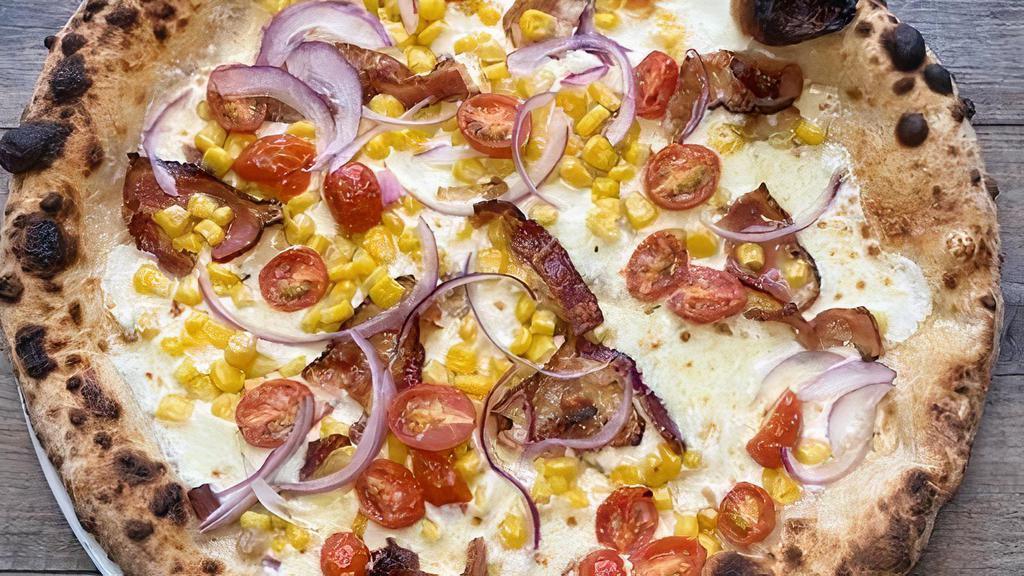 Corn Pizza · sweet roasted corn | roma tomato | red onion | smoked bacon | mozzarella | parmesan