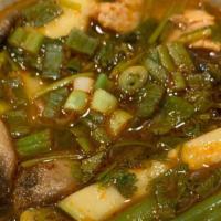 Tom Yum Soup · A savory spicy and sour soup seasonal with exotic Thai herb, mushroom, lemongrass, kaffir li...
