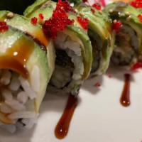 Dragon Roll · Avocado, caviar on top of the roll and eel, cucumber inside the roll.