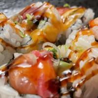  Spicy Girl Roll · Tuna, salmon, yellowtail and avocado inside, with spicy scallion outside.