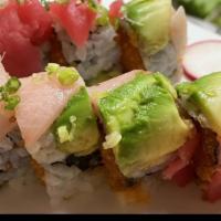 Out Of Control Roll · Spicy salmon crunchy inside, with tuna, yellowtail, and scallion on top.