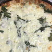 Chicago Deep Dish Spinach Pizza · Fresh spinach, garlic, oil, mozzarella and ricotta cheese.
