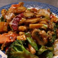 Hunan Chicken · Spicy. Sliced white meat chicken with broccoli, snow peas, carrots, straw mushroom, and baby...