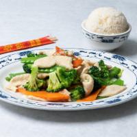 Chicken With Vegetables · Sliced chicken breast stir-fried in a white sauce. Vegetables include snow peas, carrots and...