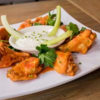 Chicken Wings · Marinated in your choice of hot (not too spicy), BBQ sauce, cajun, garlic parmesan, lemon pe...