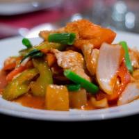 Sweet And Sour · Sautéed selection in sweet and sour sauce with onions, tomatoes, red peppers, pineapple chun...