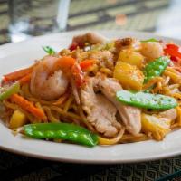 Tropical Noodles · Stir-fried egg noodles with chicken, shrimps, pineapple chunks, snow peas, bean sprouts, sca...