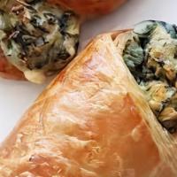 Spinach And Feta Croissant · A flakey croissant stuffed with spinach and feta cheese.