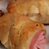 Ham And Swiss Croissant · Flakey croissant stuffed with ham and swiss cheese.