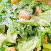Traditional Caesar Salad · Fresh crisp romaine lettuce, aged shredded Parmesan cheese, our own seasoned croutons, and c...