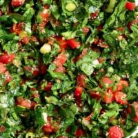 Tabbouli Salad · Cracked wheat, lemon juice and olive oil mixed with chopped fresh par sley, tomato, scallion...