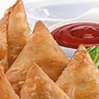 Delicious Sambusa · Sambusa is a deep fried triangular shaped pastry filled with beef meat and spices only our r...
