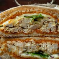 Chicken Asiago Sandwich · Grilled chicken breast, Asiago, mozzarella, sun-dried tomato pesto, red onion, lettuce and b...