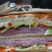 Ham And Cheese Sandwich · Ham and mozzarella cheese dressed with lettuce, tomatoes, mayonnaise and mustard. Made with ...