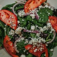 Spinach Salad · Baby spinach, tomatoes, red onions, kalamata olive, gorgonzola cheese, and balsamic dressing.