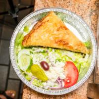 Spinach Pie & Salad Combo · Small Greek salad and a slice of spinach pie.