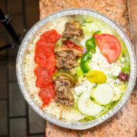 Lamb Kebab Dinner · Grilled lamb on a stick with peppers, onions & tomatoes. Served with Greek salad and your ch...