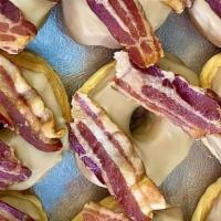 Maple Bacon Donut · Maple Bacon Donut - Donut Glazed with Maple Icing and Topped off with Bacon