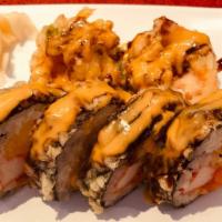 Volcano Roll · Deep fried shrimp tempura with crabstick, masago, avocado, and smoked salmon.