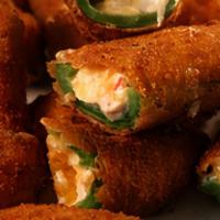 Jalapeno Poppers · Stuffed with cheddar cheese, served with marinara sauce.