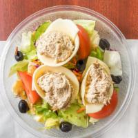 Tuna Salad · Crisp mix lettuce, tomato, cucumber, green pepper, red onion, shredded carrots, olives and r...