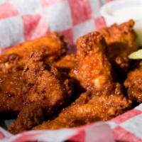 Wings (8) · Choice of Bbq, buffalo, sweet chili or old bay served with blue cheese sauce.