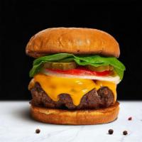 Wandering Cheese Burger · American beef patty topped with melted cheese, lettuce, tomato, onion, and pickles. Served o...
