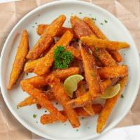 Fantastico Sweet Potato Fries · (Vegetarian) Thick-cut sweet potato wedges fried until golden brown